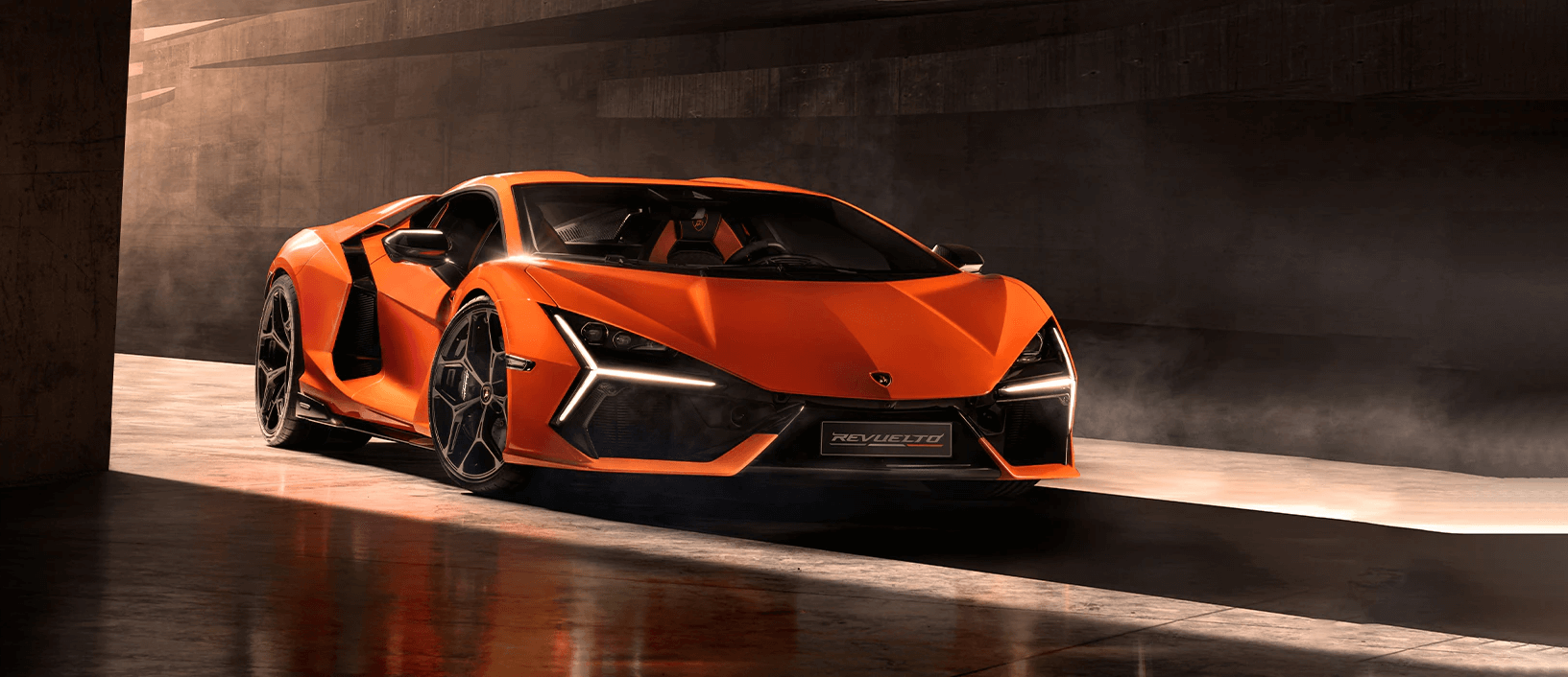 Stunning 2023 Lamborghini Revuelto in motion, showcasing its aerodynamic design and futuristic LED headlights